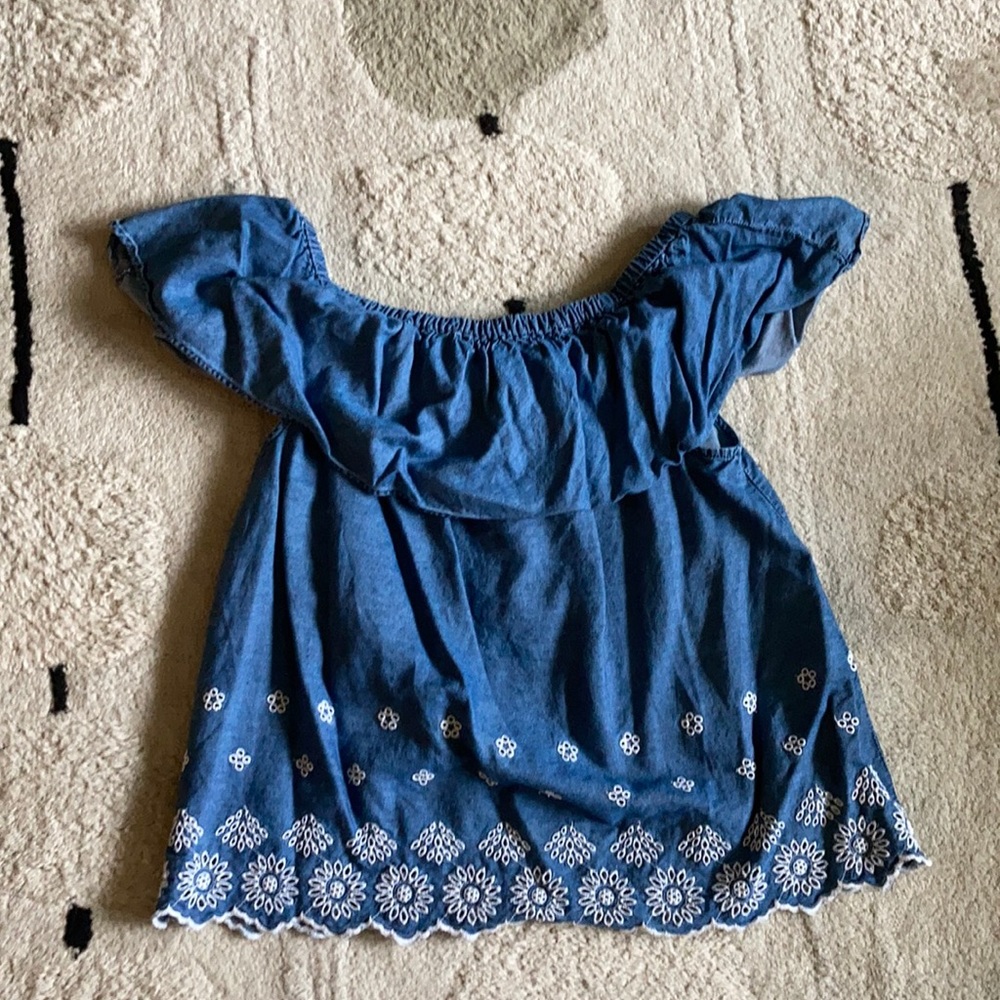 Blue off-the-shoulder shirt